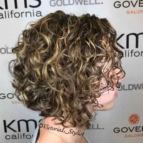 Angled Balayage Curly Bob