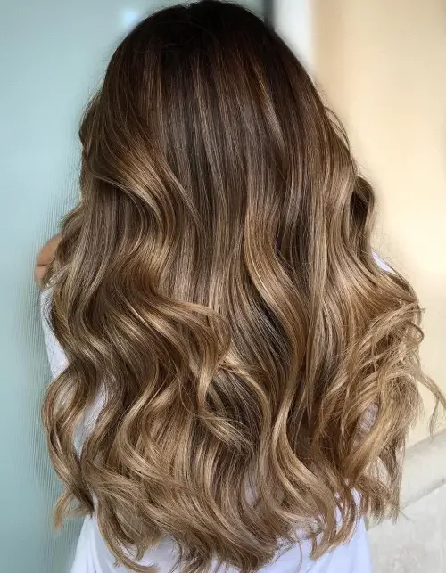 Golden Blonde Colormelt With Wavy Lob