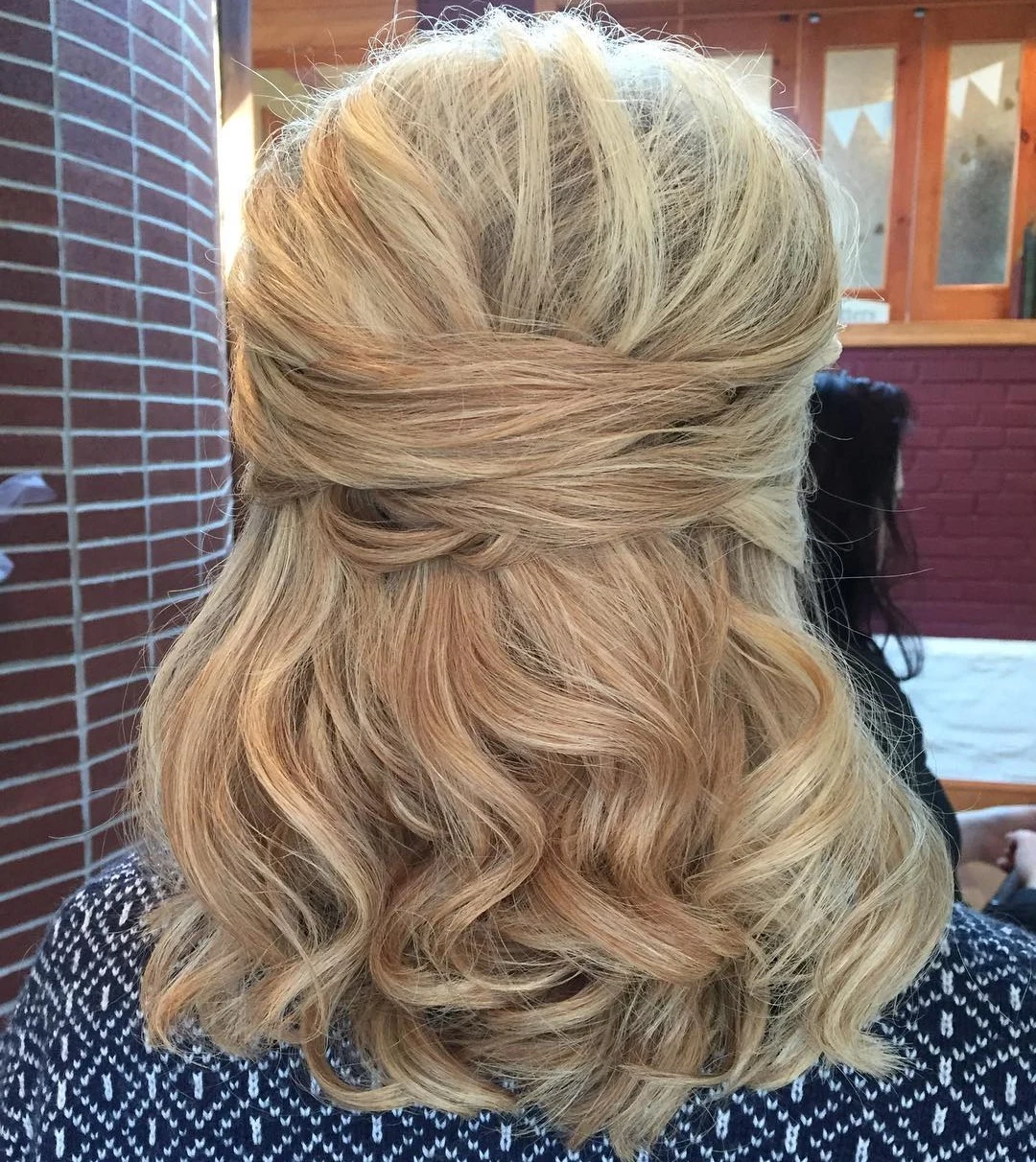 Curled Half-Up Ponytail Updo