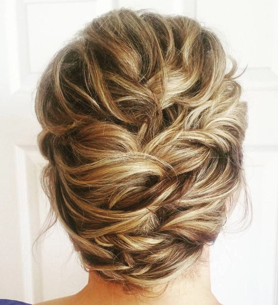 Twisted Wavy Updo With Volume