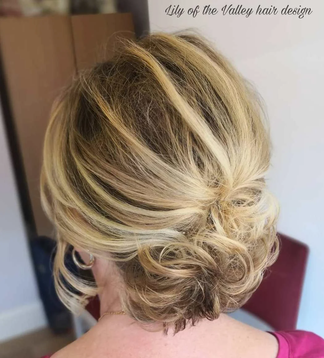 Choppy Blonde Rolled Bob Updo