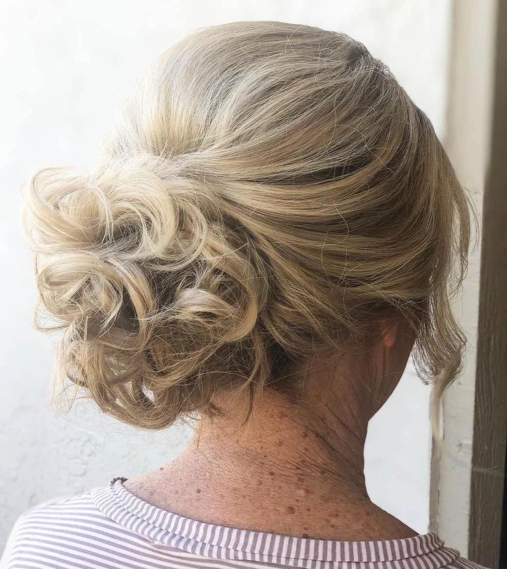 Low Bun With Soft Spiral Curls