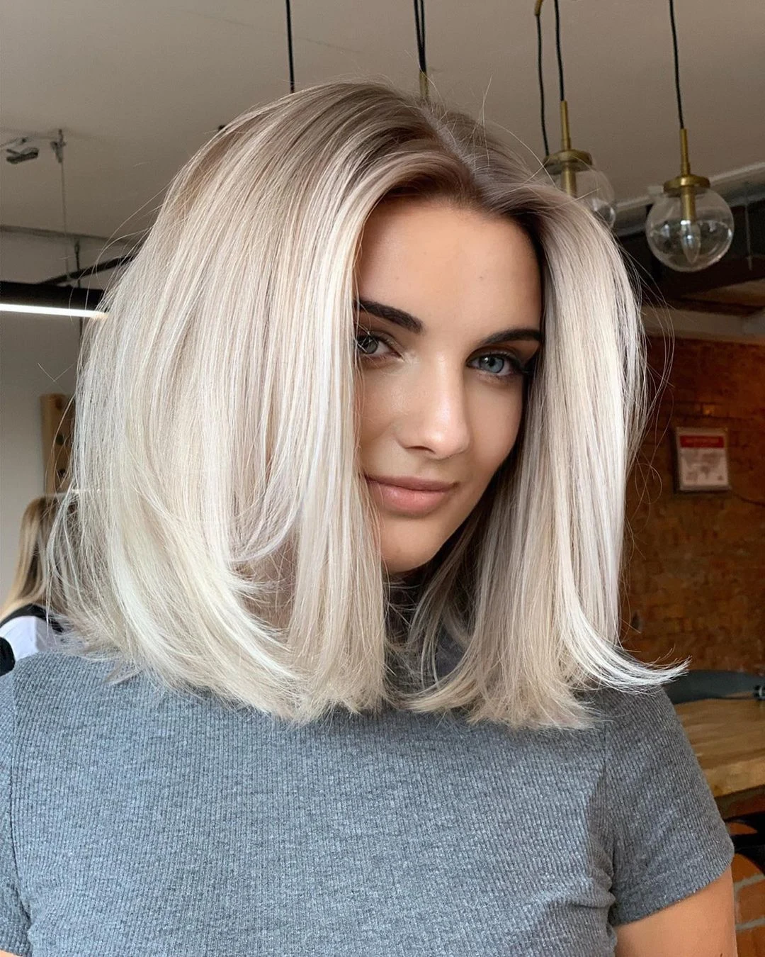 Pearl Blonde Layered Lob With Waves