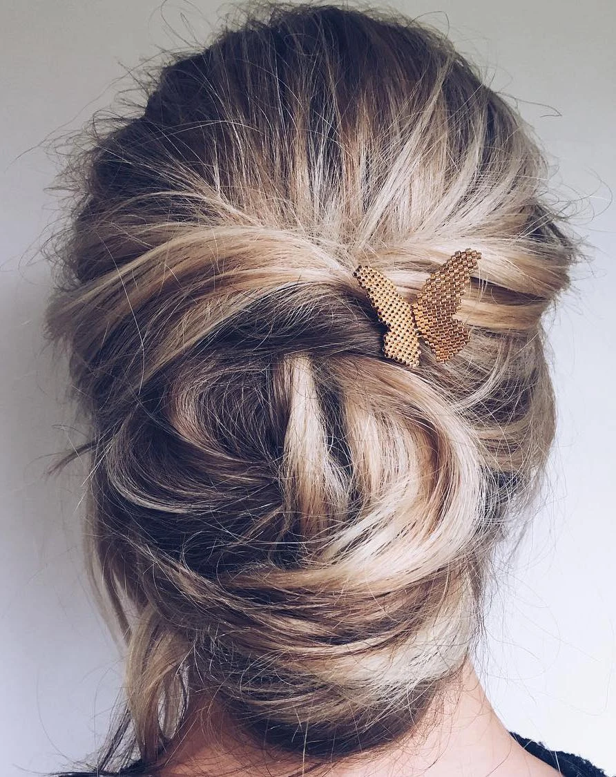 Twisted Chignon With Gold Pin