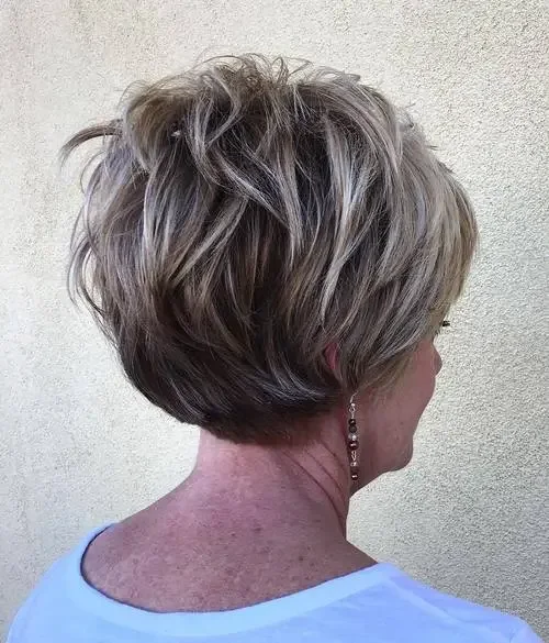 Short stacked crop with textured layers in smoky charcoal-gray tones