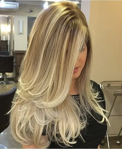 Voluminous Blonde S-Curve Waves