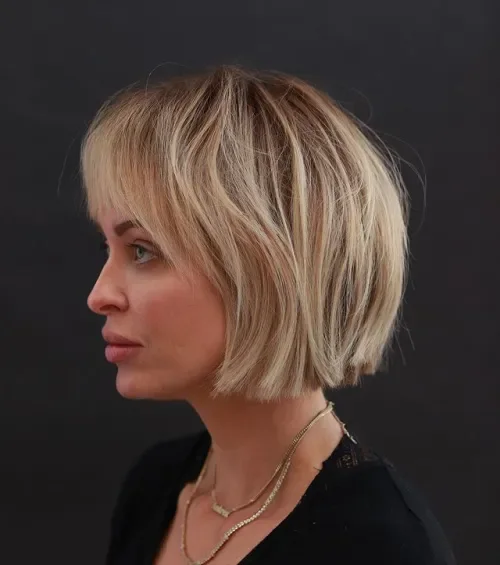 Tousled Blonde Bob With Flowy Bangs