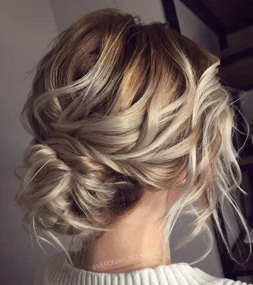 Messy Blonde Wavy Bun Updo
