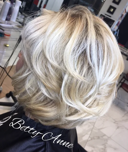 Short Blonde Wispy Layered Cut
