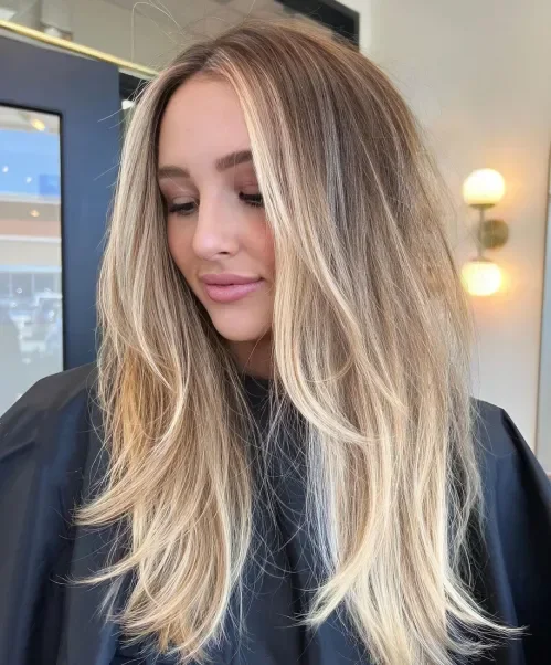 Long Blonde Layers With Front Strands Lob