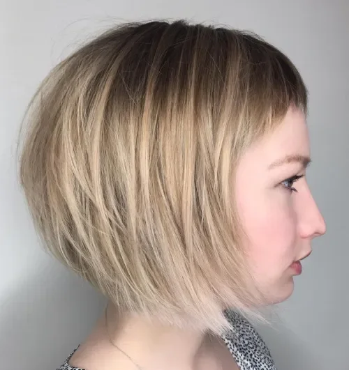 Rooty Blonde Shag Bob With Bangs