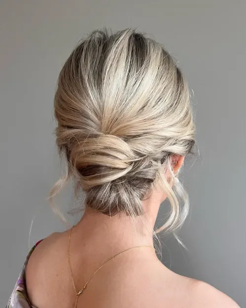 Twisted Low Bun With Loose Pieces