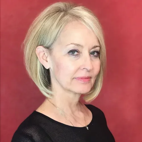 Soft blonde bob with rounded shape and blended short fringe