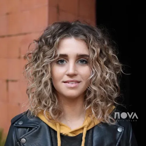 Curly Blonde Balayage Hoodie Bob