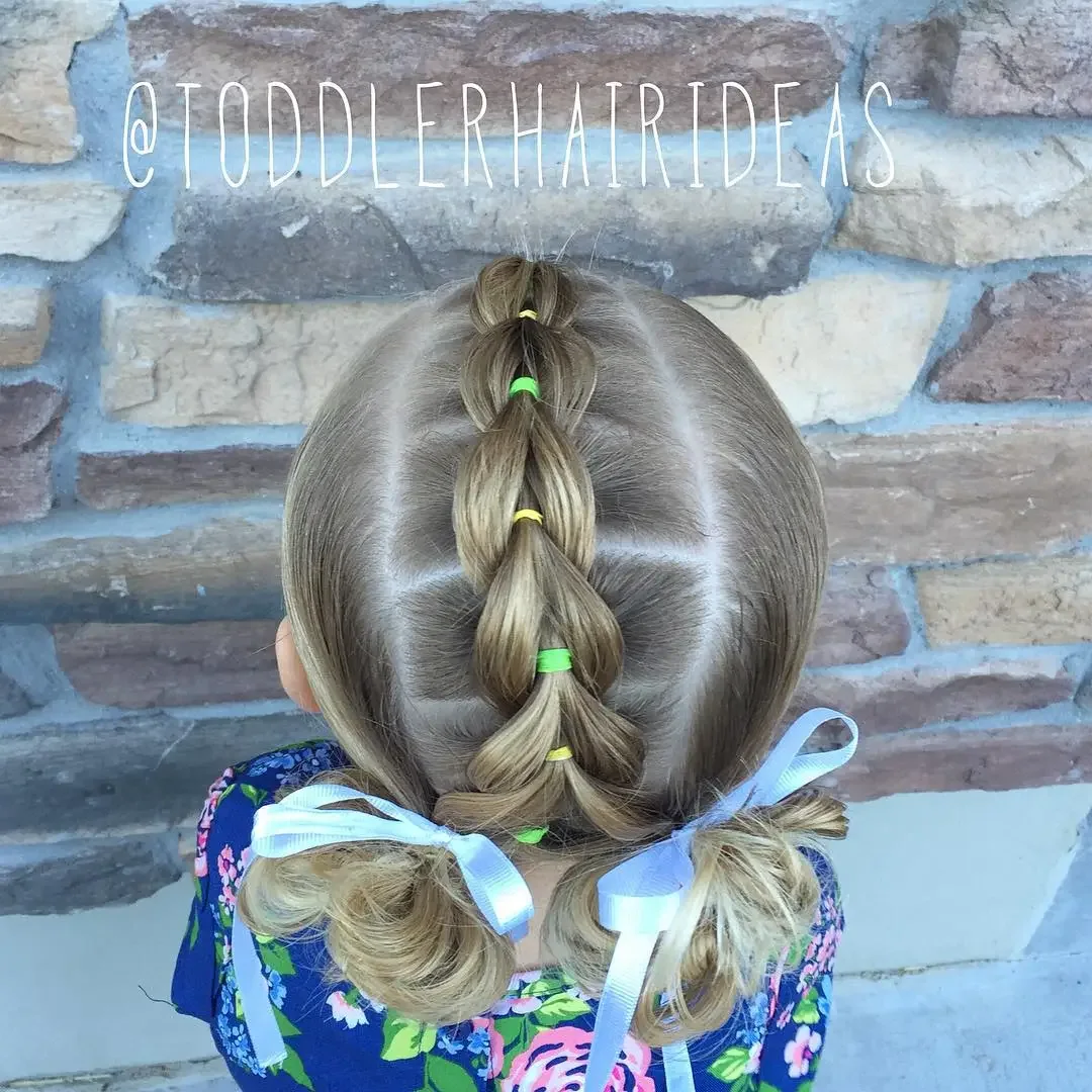 Pull-Through Braid With Two Buns