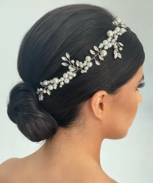 Twisted Bun With Feathered Strands
