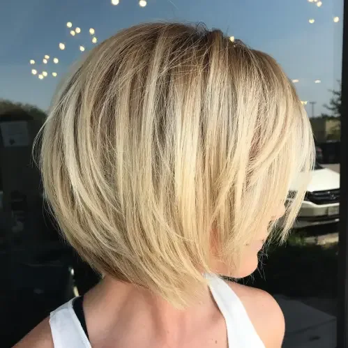 Blonde Feathered Bob With Fringe