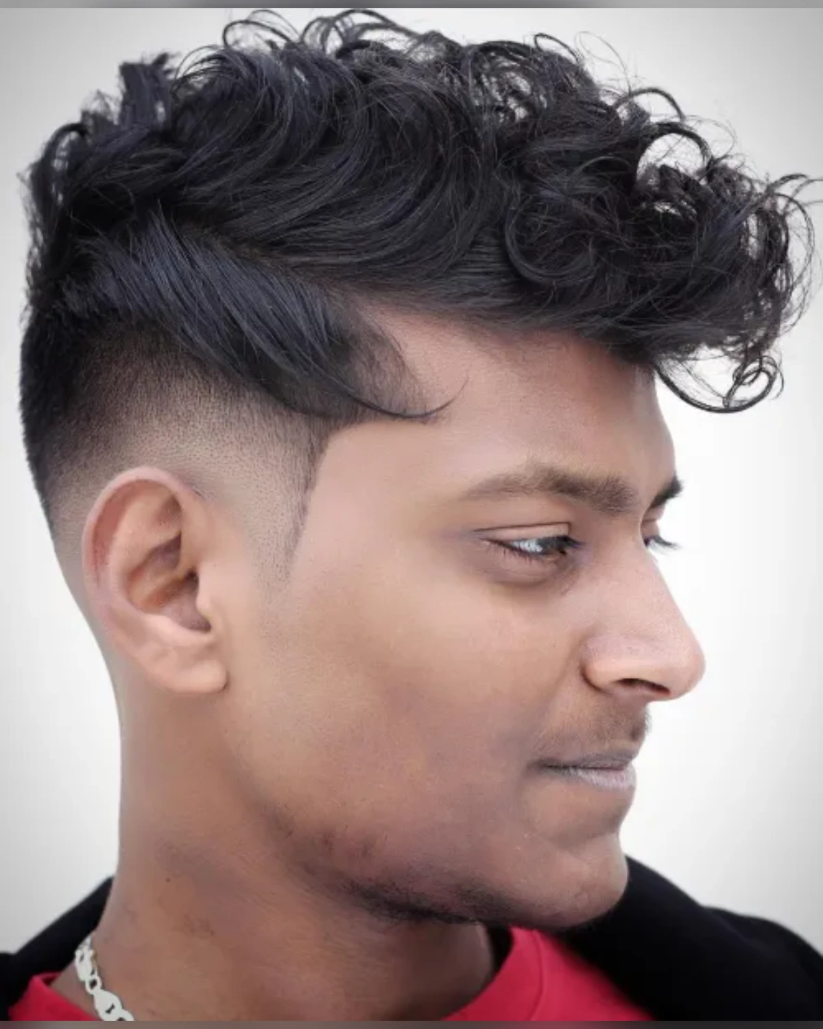 Curly Side Sweep With Skin Fade