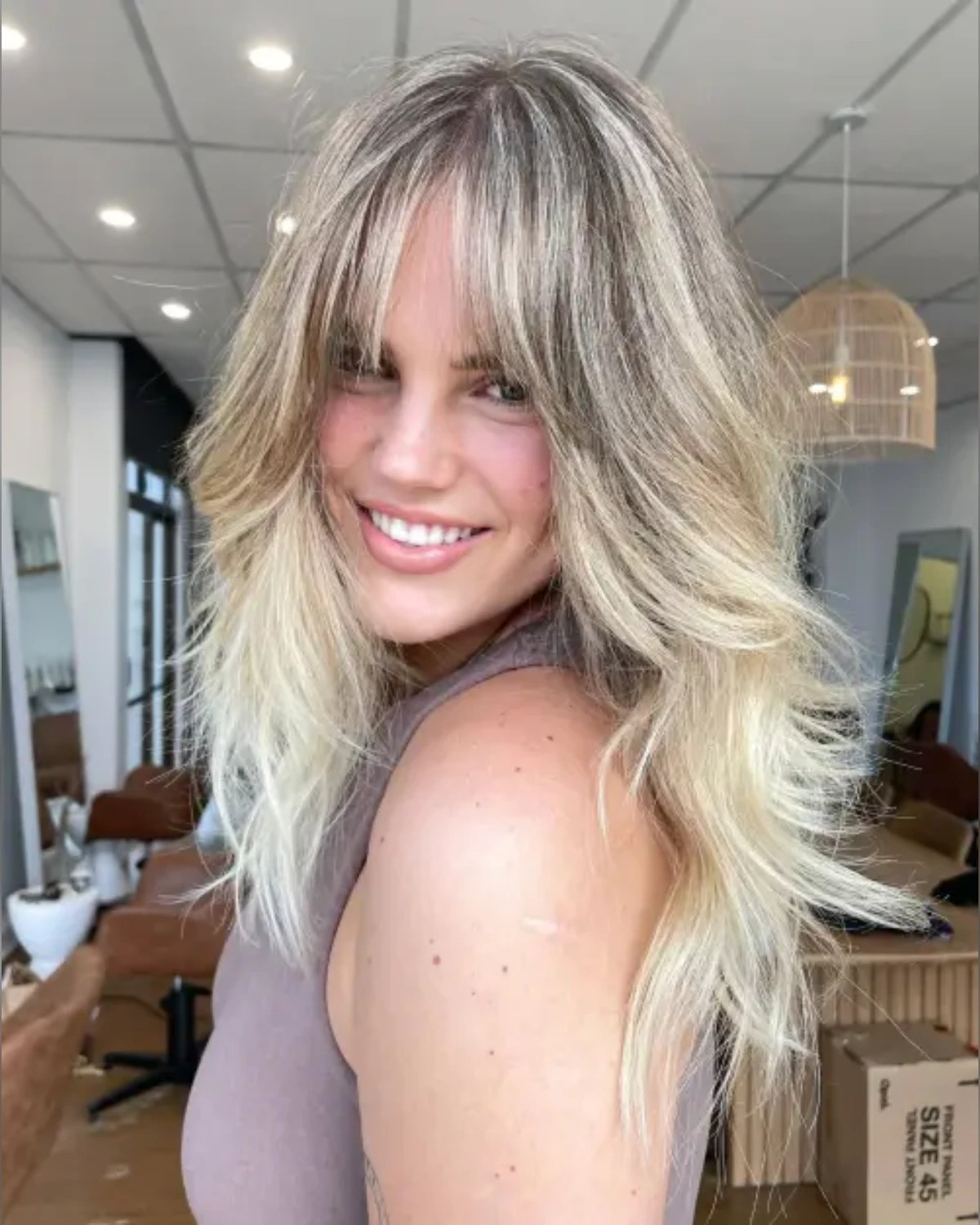 Voluminous Feathered Blonde Curtain